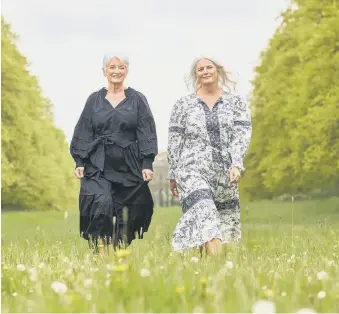  ??  ?? STROLL ON: Annie Stirk and Rachel Peru model their own favourite looks at Goldsborou­gh Hall.