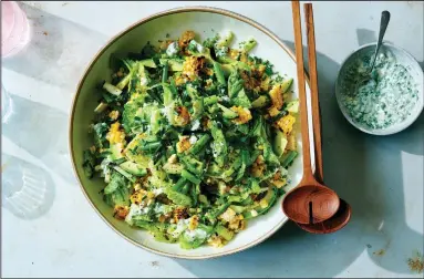  ?? (The New York Times/David Malosh) ?? Sue Li’s Grilled Corn and Avocado Salad With Feta Dressing