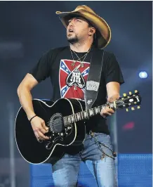  ?? DALE MACMILLAN ?? Country superstar Jason Aldean was on stage when a gunman fired into a crowd of concertgoe­rs in Las Vegas on Oct. 1. The shooting left more than 50 people dead and 500 injured.