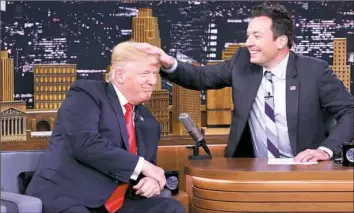  ?? Andrew Lipovsky/NBC via AP ?? Donald Trump appears with host Jimmy Fallon during a taping of “The Tonight Show Starring Jimmy Fallon,” Thursday in New York.