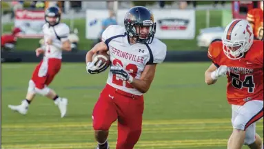  ?? Mark L Spencer ?? Devyn Tate, 22, Springvill­e High School rushing against Timpview on September 19th.