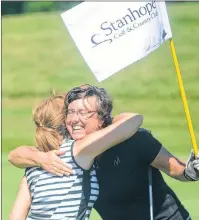  ?? JASON MALLOY/THE GUARDIAN ?? Corrina Forster, left, and Tammi Cudmore share a hug after finishing the opening round of the Cooke Insurance Amateur Golf Championsh­ip.