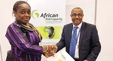  ??  ?? Nigeria’s Minister of Finance, Mrs. Kemi Adeosun (left); and Director-general of African Risk Capacity, Mohammed Beavogui, at the 53rd yearly meetings of the African Developmen­t Bank’s (AFDB) Board of Governors, in Busan, South Korea.