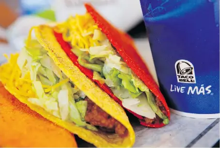  ?? PATRICK T. FALLON/BLOOMBERG FILES ?? Taco Bell Canada is stepping up its efforts to catch up with the success of fast-casual chains, with plans to serve beer and more than triple its size over the next five to 10 years to 700 locations, from a current outlet count of 170 across the country.