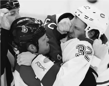  ?? CANADIAN PRESS ?? There’s little politeness on the ice as Ottawa Senators’ Chris Neil, of Markdale, Ont., mixes it up with Montreal Canadiens’ Travis Moen, of Swift Current, Sask., during playoff action last May.