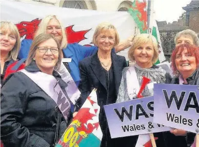  ??  ?? Members of the Bridgend and the Valleys branch of national campaign Waspi protest outside the Houses of Parliament, along with Baroness Glenys Kinnock, who gave them her support