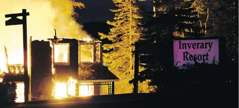  ?? PHOTOS: ANDREW BROOKS/THE VICTORIA STANDARD/THE CANADIAN PRESS ?? The main lodge of the historic Inerary Resort inn on Cape Breton’s Bras d’Or Lakes was destroyed by a raging fire early Thursday, taking with it one of the small community’s main employers and a popular site for tourists that dates back to the 1800’s.