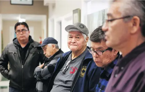  ?? CHAD HIPOLITO/THE CANADIAN PRESS ?? Hereditary chiefs Chief Smogelgem, left, Chief Warner Williams, Chief Madeek, Chief Hagwilnegh­l and Chief Na’Moks talk to reporters after meeting with the RCMP and Coastal GasLink representa­tives to end a blockade on Wet’suwet’en land.