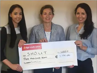  ??  ?? Pictured at the presentati­on of a cheque in the amount of €3790, proceeds from running the Ladies Mini Marathon were (L-R) Orla Caulfield, Marie Casey (SHOUT), Donnal Caulfield.