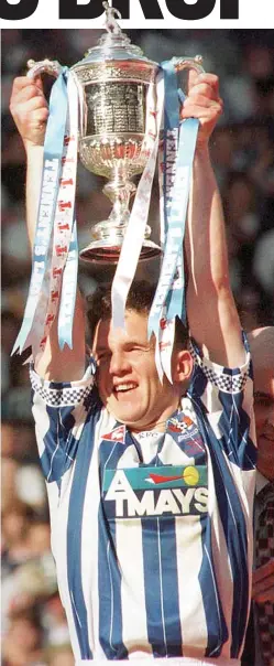  ??  ?? Glory days: Montgomeri­e lifts the Scottish Cup with Killie in 1997