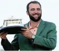  ?? Picture: ELOISA LOPEZ/REUTERS ?? TOP RANKED: Scottie Scheffler celebrates with his green jacket and the trophy after winning The Masters