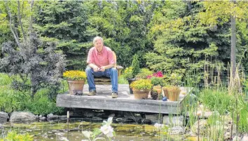  ?? SUBMITTED PHOTO ?? Mark Cullen enjoys a staycation in his garden, which includes a fenced-off pond.