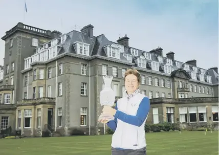  ??  ?? 0 European team captain Catriona Matthew with the Solheim Cup outside the Gleneagles Hotel.