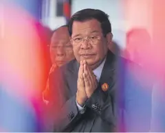  ??  ?? Hun Sen at the Cambodian People’s Party headquarte­rs to mark the 38th anniversar­y of the toppling of Pol Pot’s Khmer Rouge regime in Phnom Penh on Jan 7.