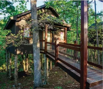  ?? SUBMITTED PHOTO ?? There is no shortage of interestin­g accommodat­ions at Eureka Springs Treehouses, Caves, Castles & Hobbits, which provides some treetop lodgings with woodland views.