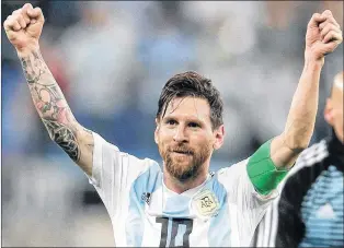  ?? AP PHOTO ?? Argentina’s Lionel Messi celebrates after the Group D match against Nigeria at the 2018 soccer World Cup in St. Petersburg, Russia, Tuesday. Argentina won 2-1.