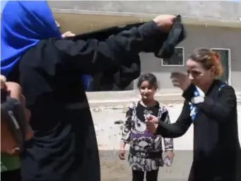  ??  ?? Syrian women after being freed from the Isis stronghold in Raqqa