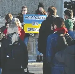  ?? Ed Kaiser ?? Protesters at the University of Alberta in Edmonton demonstrat­e against an assistant lecturer’s denial of the Holodomor famine.