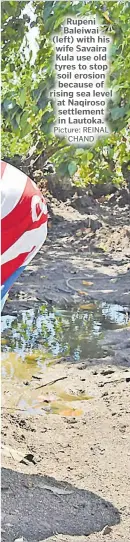  ?? Picture: REINAL CHAND ?? Rupeni Baleiwai (left) with his wife Savaira Kula use old tyres to stop soil erosion because of rising sea level at Naqiroso settlement in Lautoka.