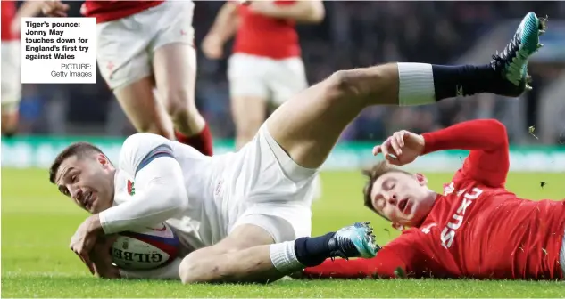  ?? PICTURE: Getty Images ?? Tiger’s pounce: Jonny May touches down for England’s first try against Wales