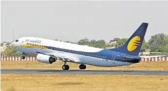  ?? /Reuters ?? Air waves: Jet Airways and stateowned Air India compete to offer low fares, but rising operationa­l costs mean they, and other carriers, struggle to make a profit.