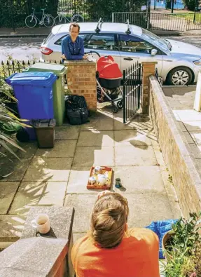  ??  ?? Doorsteps became vital for safe-distance chatting and deliveries of local produce, including bread baked for her village by the writer’s friend, Caroline (below). Opposite: the shielding elderly got used to remote communicat­ions and learnt to Zoom