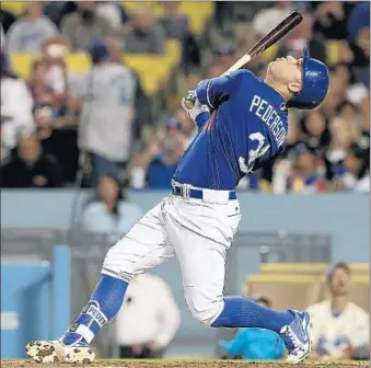  ?? Robert Gauthier Los Angeles Times ?? TWENTY HOME RUNS in the f irst half made Joc Pederson an All- Star last year, but after the break he hit just .178 with six homers. Too many at- bats looked like this one, a pop up against Angels last week.