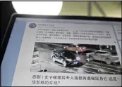  ?? AP ?? A website shows a frame from a video of a woman as she is run over by a car at a traffic junction in China on April 21.