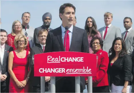  ?? DARRYL DYCK/THE CANADIAN PRESS/FILES ?? A UBC political scientist says B.C. MPs such as Terry Beech, Pamela Goldsmith-Jones and Jonathan Wilkinson, front row, left to right, would see their seats “at risk” should Justin Trudeau and his cabinet come down in favour of Kinder Morgan’s proposed...