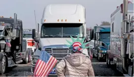  ?? STEFANI REYNOLDS/AGENCE FRANCE-PRESSE ?? TRUCKS gather for the People's Convoy at Hagerstown Speedway in Hagerstown, Maryland. Hundreds of truckers and their supporters in the convoy set off from southern California to Washington to protest against Covid-19 pandemic restrictio­ns.