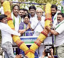  ?? V. RAJU ?? YSRCP Visakhapat­nam South Assembly constituen­cy nominee V. Ganesh Kumar, Lok Sabha constituen­cy nominee Botcha Jhansi and party North Andhra coordinato­r Y.V. Subba Reddy greeting people during a road show in the city on Wednesday.