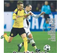  ?? AFPPIX ?? Dortmund’s Marco Reus (left) and Legia´s Michal Kucharczyk vie for the ball during their Champions League match yesterday. –