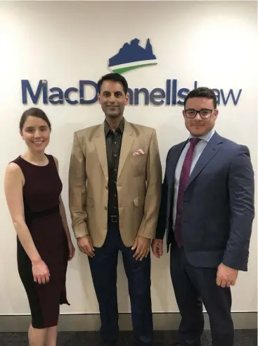  ??  ?? CHANGING OF GUARD: MacDonnell­s Law law director Luckbir Singh (centre) with new owner and director Melissa Sinopoli and practice leader Patrick Day.