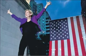  ?? Craig Ruttle Associated Press ?? SEN. ELIZABETH WARREN acknowledg­es supporters at a campaign rally in New York in September.