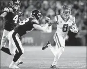  ?? Chadd Cady ?? AMON-RA ST. BROWN tries to pick up extra yardage after a catch in the second quarter against Iowa.