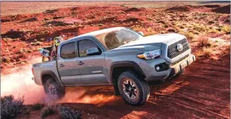  ??  ?? The 2018 Toyota Tacoma offers the lowest long-term operating costs of all mid-size pickup trucks.