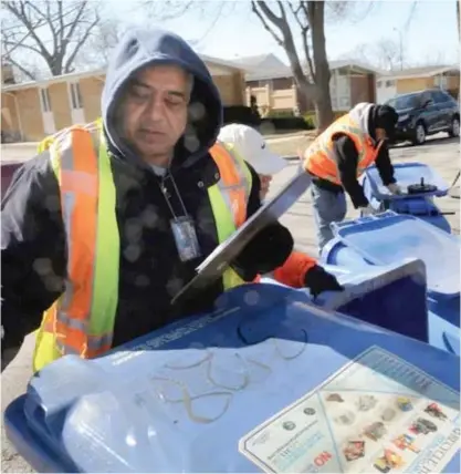  ?? SUN-TIMES FILE PHOTO ?? A new report gives dozens of ways the city can improve its recycling program.