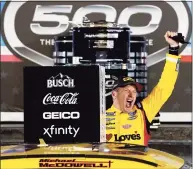  ?? Chris Graythen / Getty Images ?? Michael McDowell celebrates in victory lane after winning the Daytona 500 earlier this month.