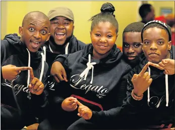  ?? Picture: FREDLIN ADRIAAN ?? JUST STOKED: Legato members – from left, Phiwokuhle Tyatya, Lwando Lukhoko, Unathi Ntlabathi, Luyolo Stungu and Milani Sixakwe – celebrate on arrival back in the Bay after taking part in the first ‘Sing-Off SA’