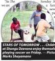  ?? ?? family newspaper and as
we
STARS OF TOMORROW . . . Children at Shungu Dzevana enjoy themselves playing soccer on Friday. — Picture: Marks Shayamano