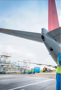  ??  ?? Right: Engineers at an aeronautic­al maintenanc­e plant in Nouaceur, south of Casablanca.