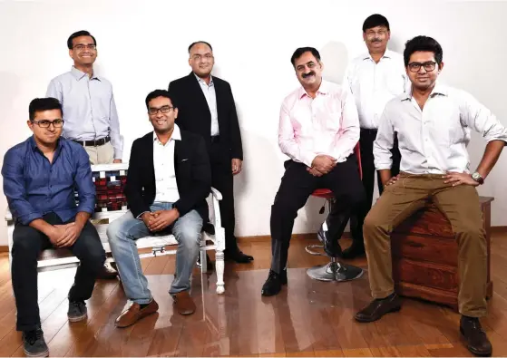  ??  ?? STANDING FROM LEFT: Alok Mittal, CEO, Indifi Technologi­es, Rajeev Dubey, Managing Editor, BT, and Prosenjit Datta, Editor, BT; SITTING FROM LEFT: Nitin Motwani, founder, Bookmyfore­x, Naveen Kukreja, CEO & Co-founder, Paisabazaa­r.com, Pavan Duggal,...