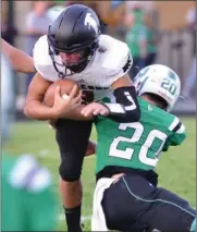  ?? PILOT PHOTO/RON HARAMIA ?? Freshman Austin White is getting his chance behind center with Nathan Creed moving to running back in the Glenn lineup.