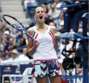  ?? JASON DECROW — THE ASSOCIATED PRESS ?? Karolina Pliskova celebrates after defeating Zhang Shuai in the third round at the U.S. Open on Saturday.