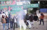  ??  ?? RJD workers celebrate outside the party’s headquarte­rs after the Jmm-congress-rjd alliance won the Jharkhand assembly polls in Patna on Monday. IANS