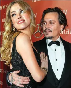  ??  ?? Tumultous marriage: Johnny Depp and Amber Heard