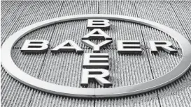  ?? Markus Schreiber / Associated Press file ?? The Bayer logo displayed on a building of the German drug and chemicals company in Berlin. Monsanto is rejecting a $62 billion takeover bid, but Bayer said it is confident it can address any potential financing or regulatory issues.