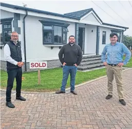  ??  ?? Simon Sleep, business developmen­t manager for Willerby Bespoke, Isaac McKenzie of McKenzie Burke and Heritage Park Estates director Nathan Smith.