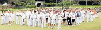  ??  ?? LINE UP: The 88 players from seven districts lined up at the Kowie Bowls Club to celebrate the start of the 2017 Inter Sub-District Bowls Championsh­ips on Friday last week
