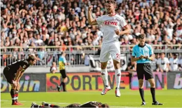  ?? Foto: Christian Charisius, dpa ?? Wo gejubelt wird, wird auch getrauert. Kölns Salih Özcan freut sich über seinen Treffer zum 5:3.